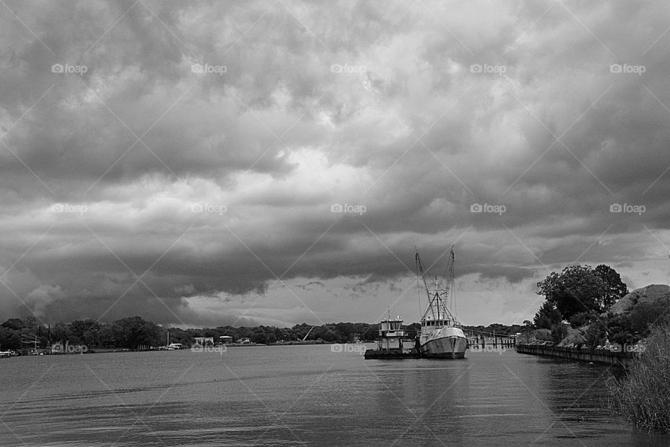 Ship in the bay during storm 