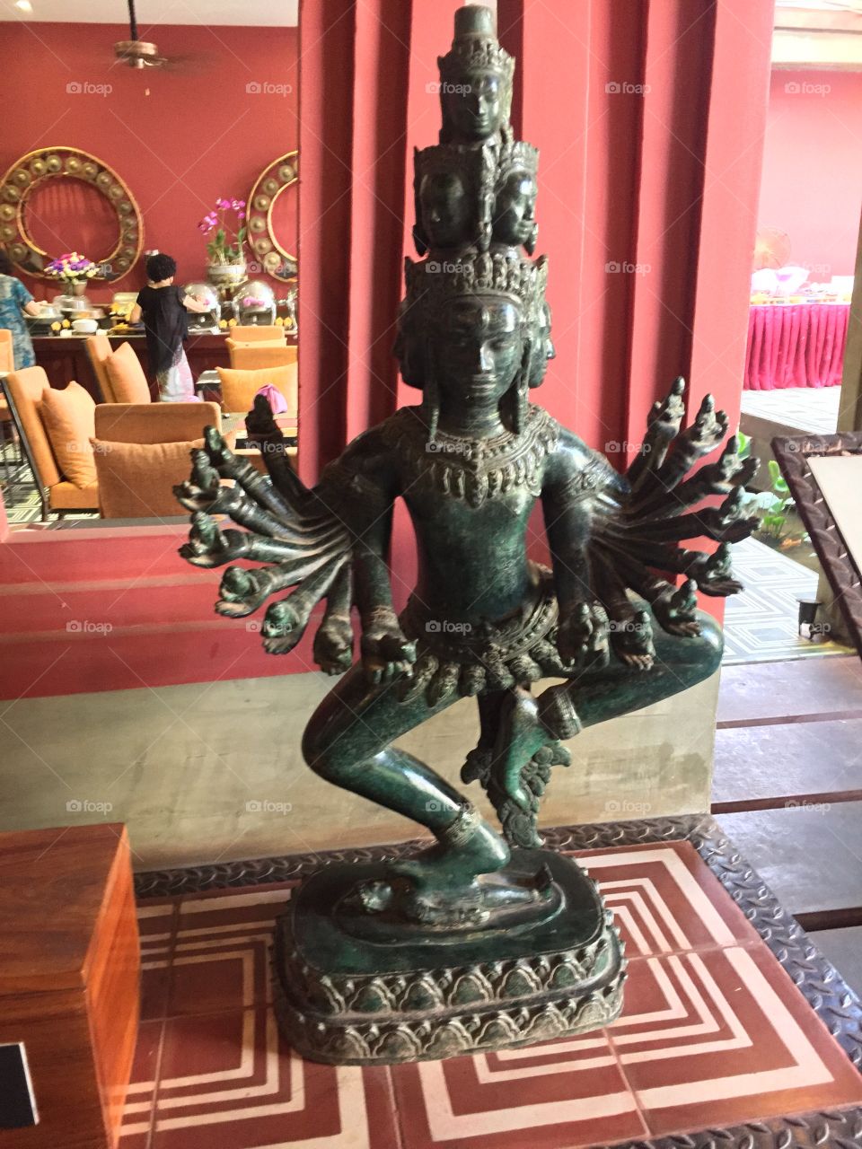 A God who protects with all his faces and arms, Cambodia- Siem Reep