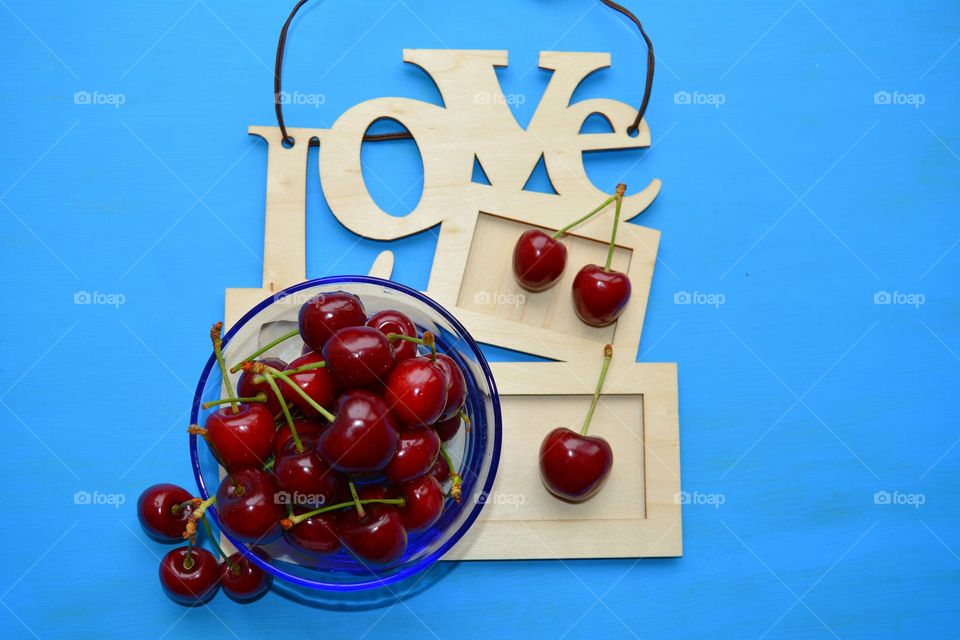 red cherry tasty summer food top view table blue background