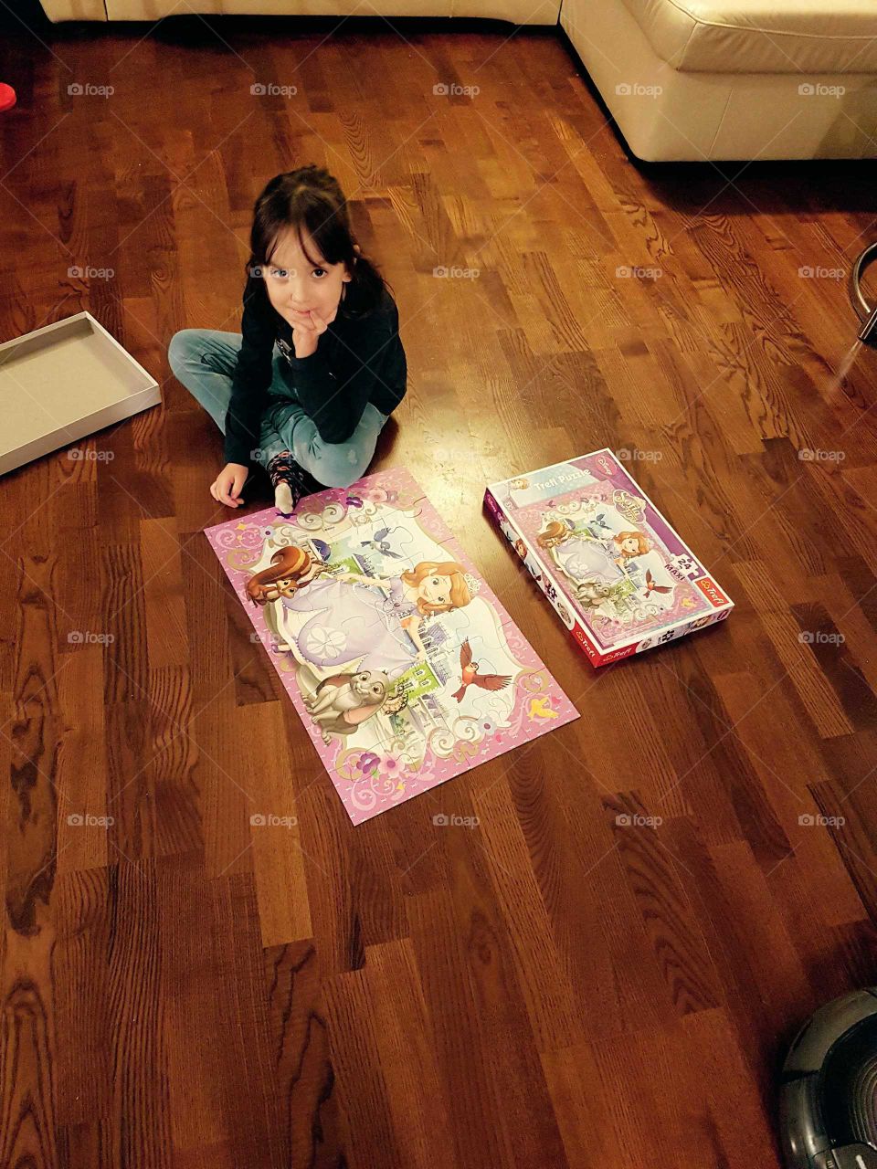 Girl playing puzzles