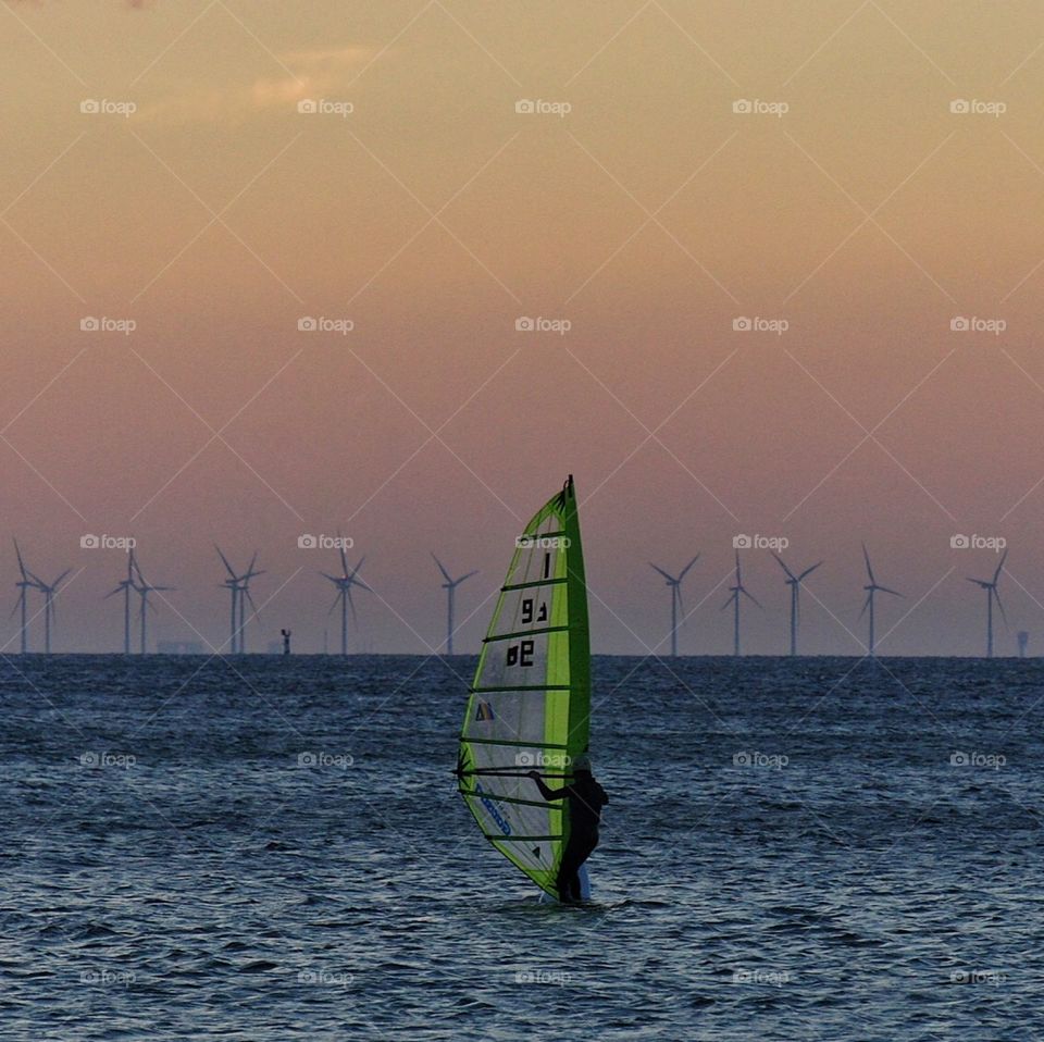 Windsurfer at dusk