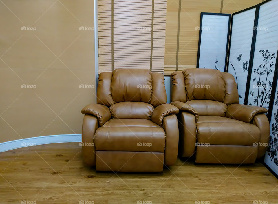 Chairs with soft corners  on the wooden floor.