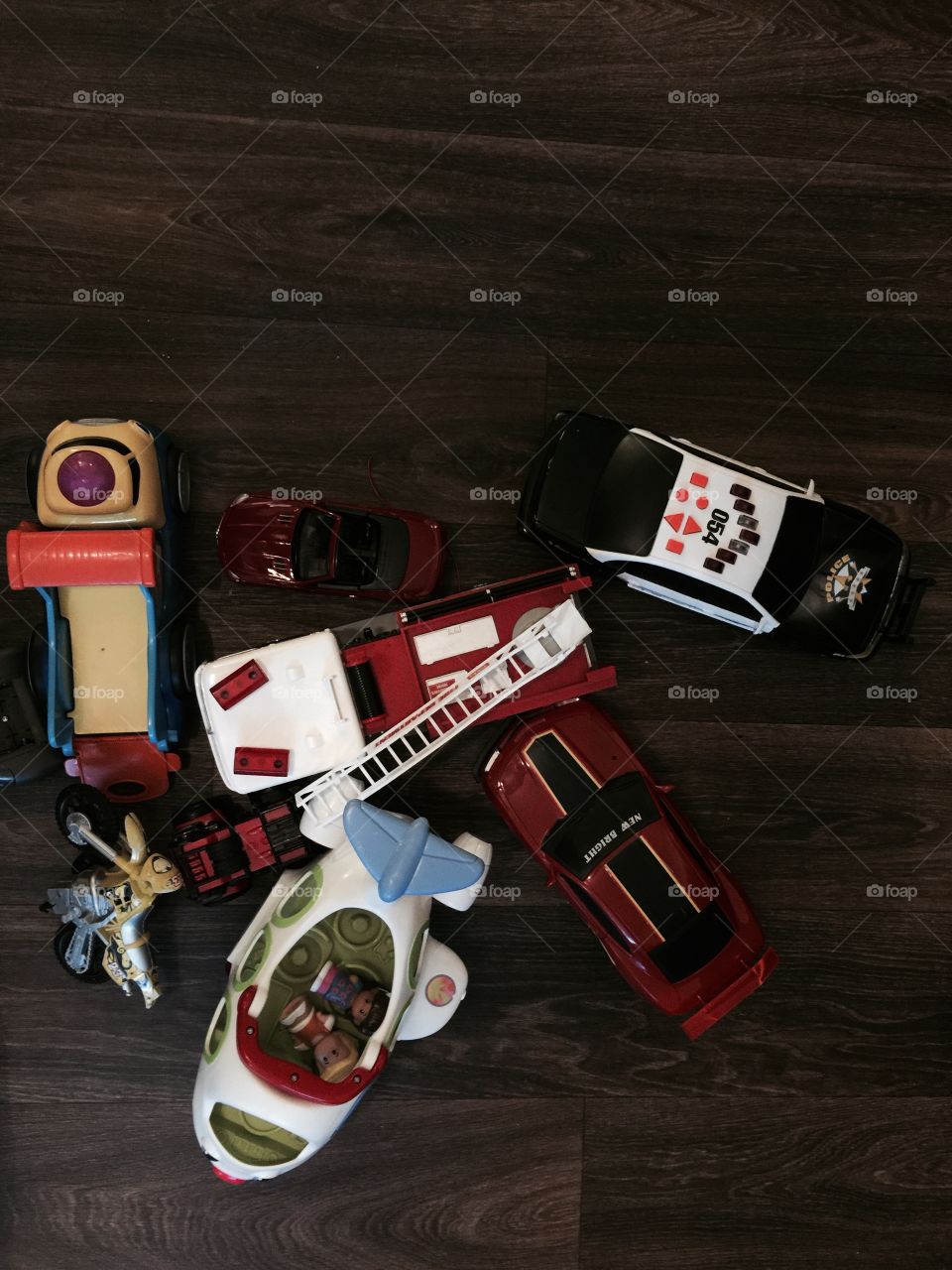 Toys and car and fire truck . Toys 