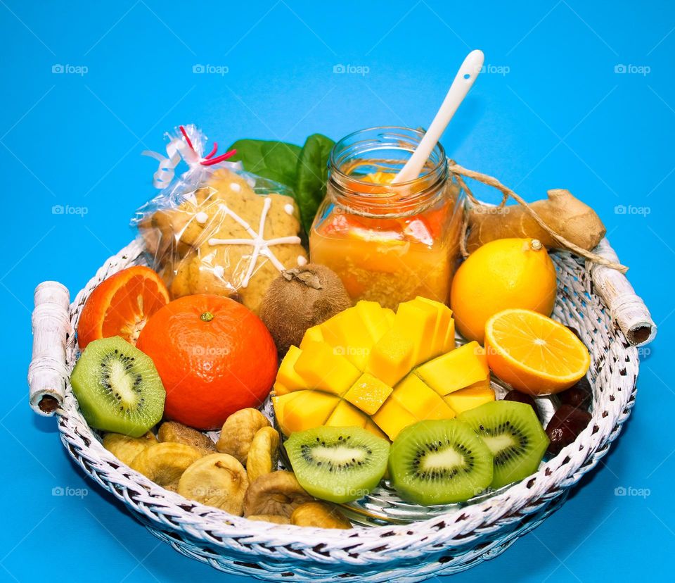 Winter fruit detox: lemon, tangerine, mango, kiwi, dried figs, dates and ginger