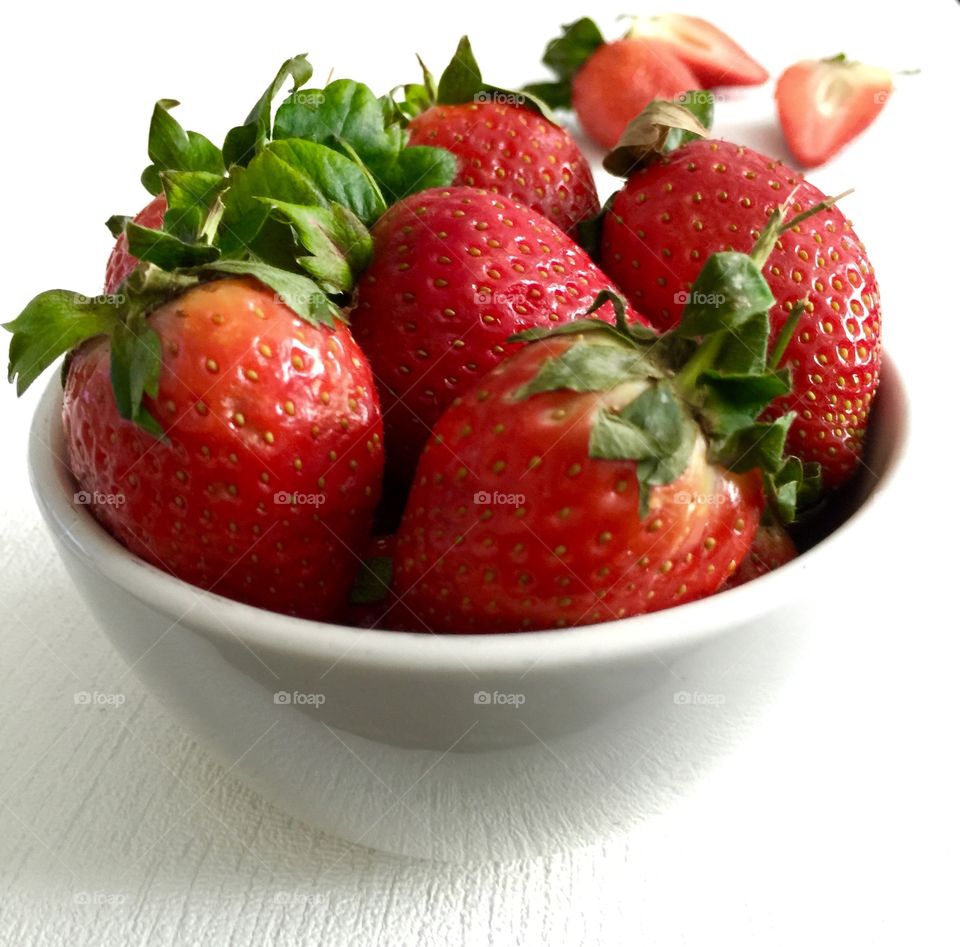 Bowl of fresh  seasonal strawberries 