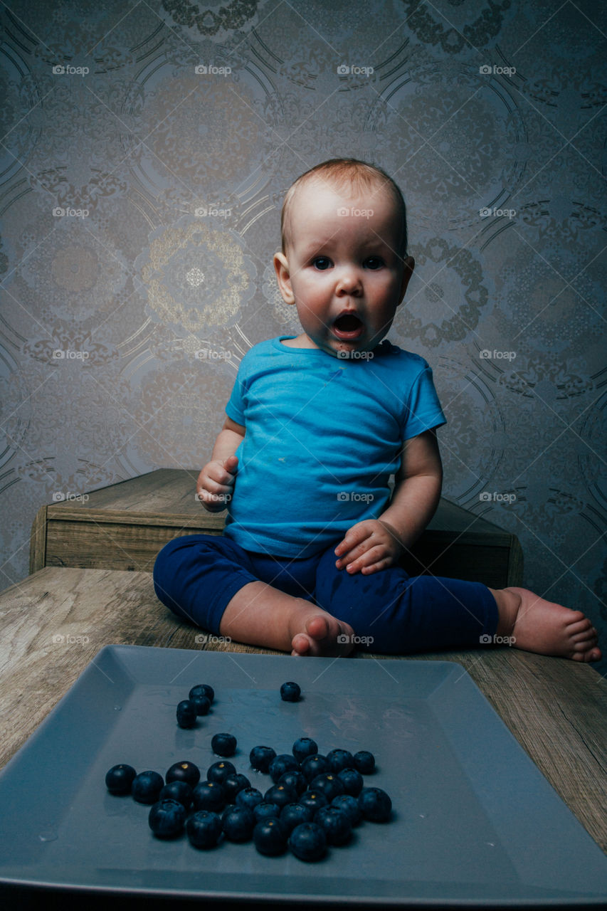 Baby eating the blueberries