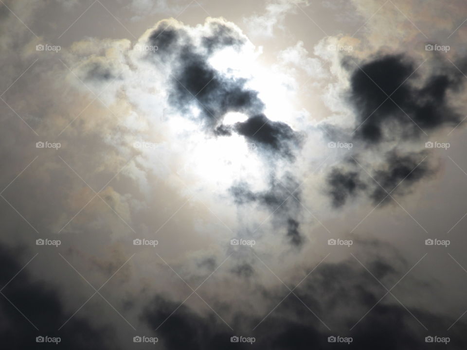 clouds in front of sun