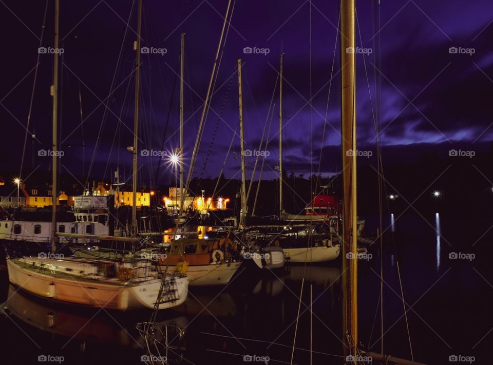 Ships on the sea, docked at the pier, long exposure photography, long exposure boat shot, purple skies in Scotland 