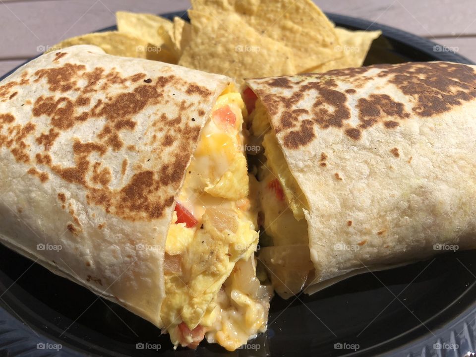 Egg burrito and tortilla chips