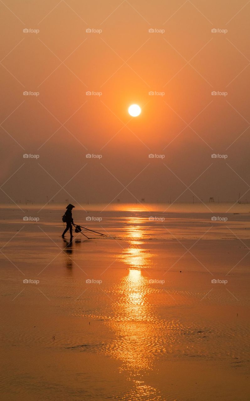 Working during the beautiful sunrise 