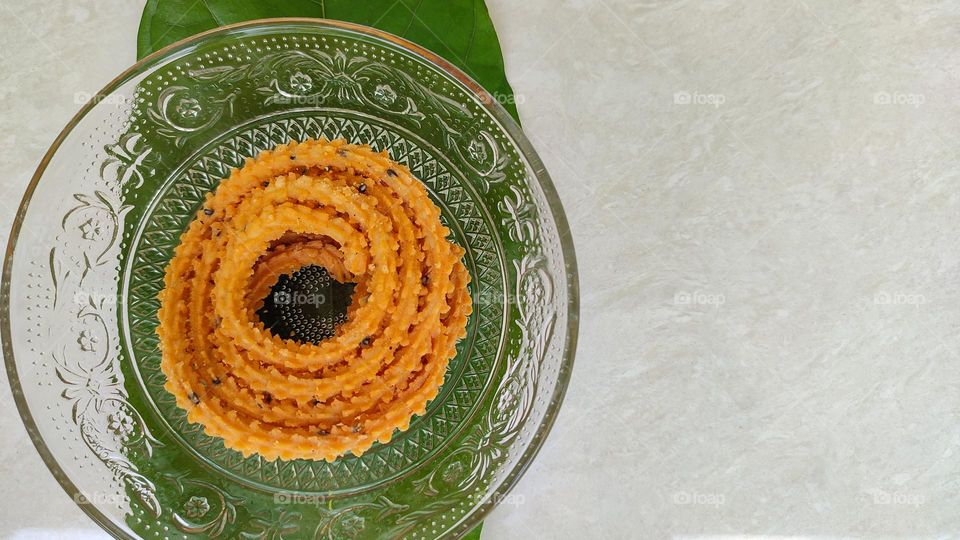 The Circle of Snacks, murukku, a snack usually made of rice or urad dal flour, formed into a twisty shape, Indian snacks