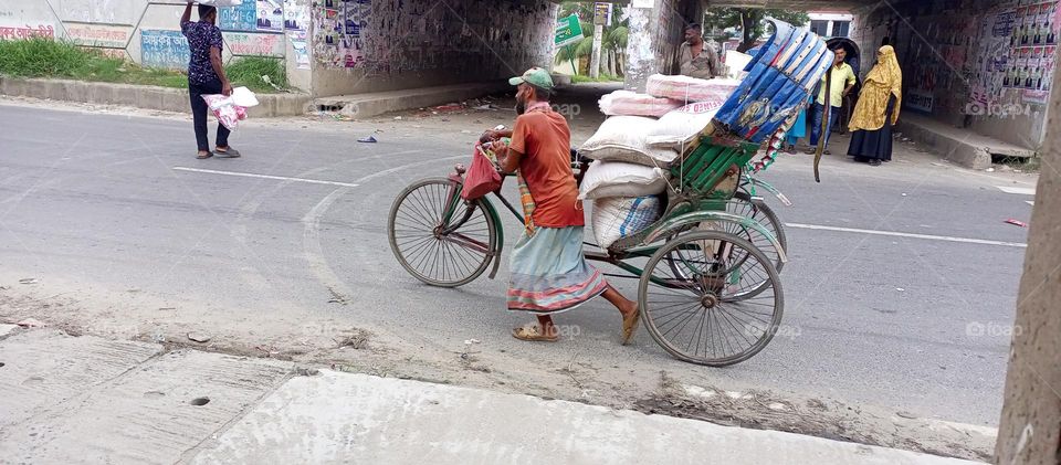 A rickshaw pullar