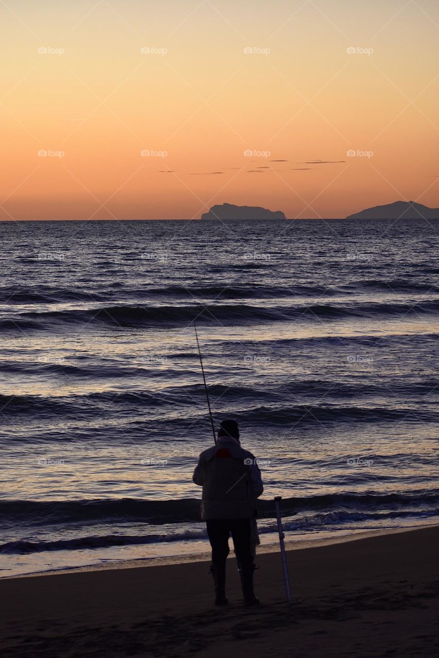 Fishing at sunset 