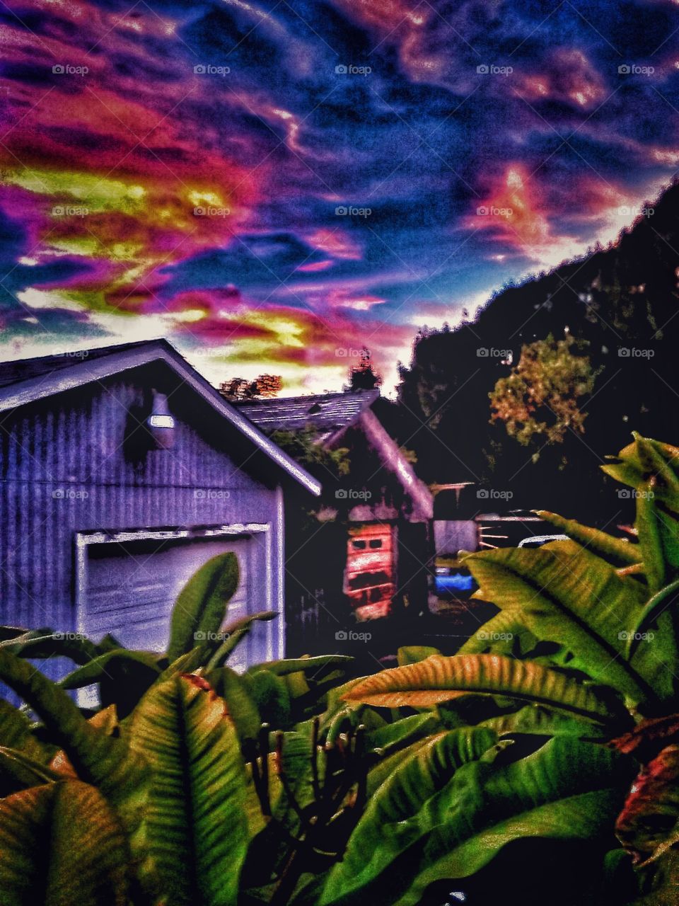 Vivid Sheds And Sky With Clouds