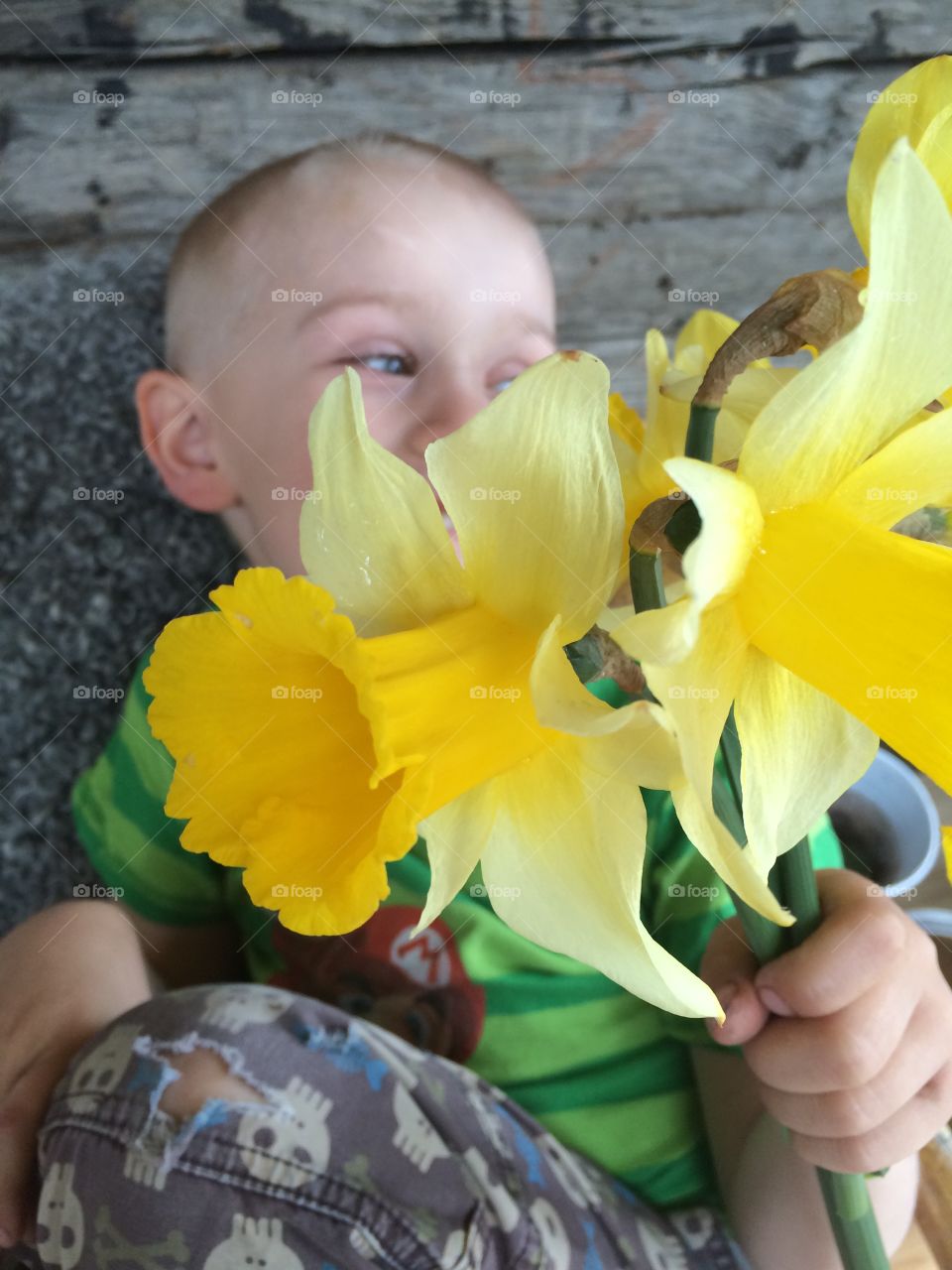 Boy with daffodils