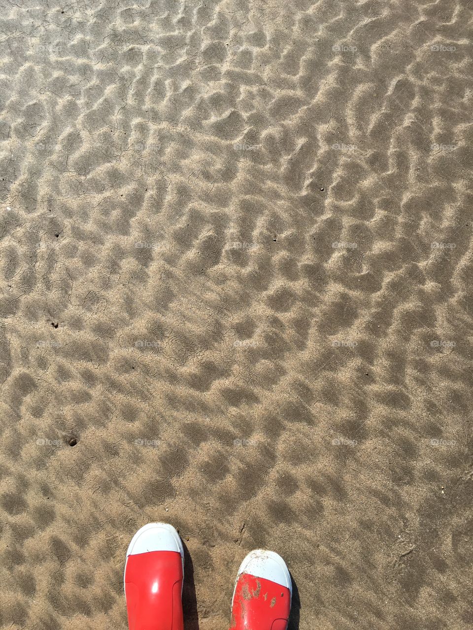 Sand patterns at my feet. 