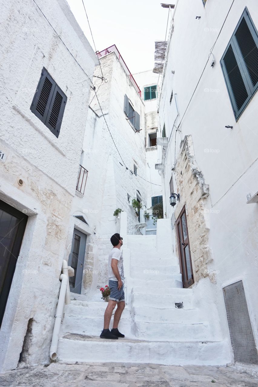 Boy in the italian street of ostuni