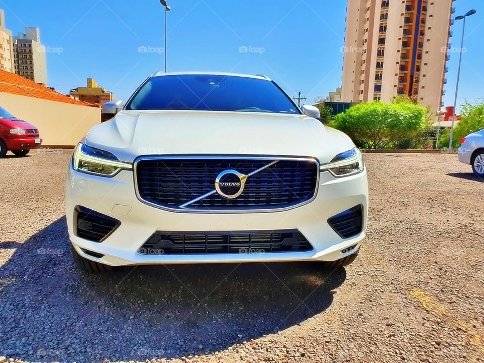 race journey motion business worker detail dealership buying speed power street trip electric futuristic fun vacation xenon electricity rent young model woman electric car parking highway shiny garage engine metallic reflection tire day vehicle car a