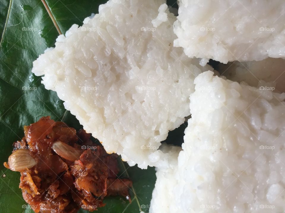 Milk rice with hot chili paste- Traditional breakfast in Sri Lanka 