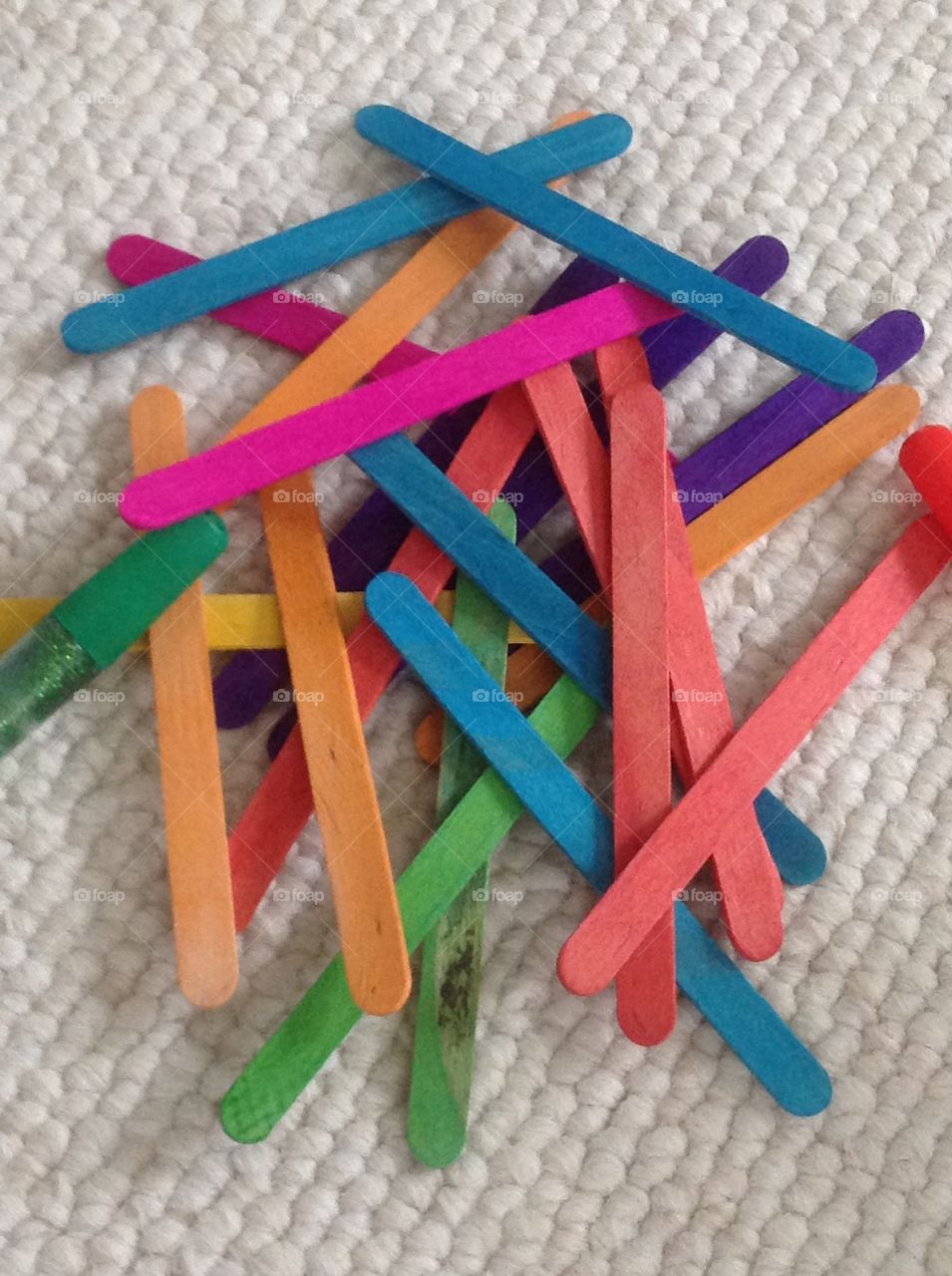 Different colors of popcicle sticks for arts and crafts supplies. 