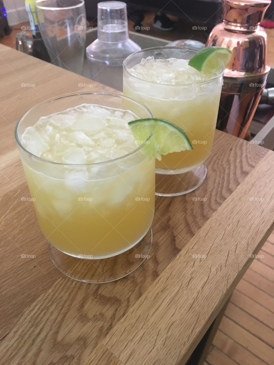 Drinks glass lime yellow pineapple juice Malibu rum