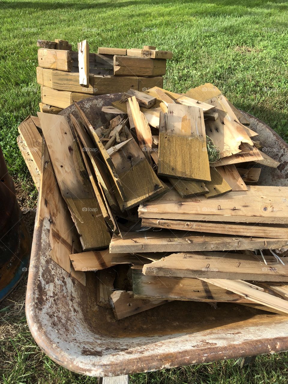 Wood scraps old wheel barrow 