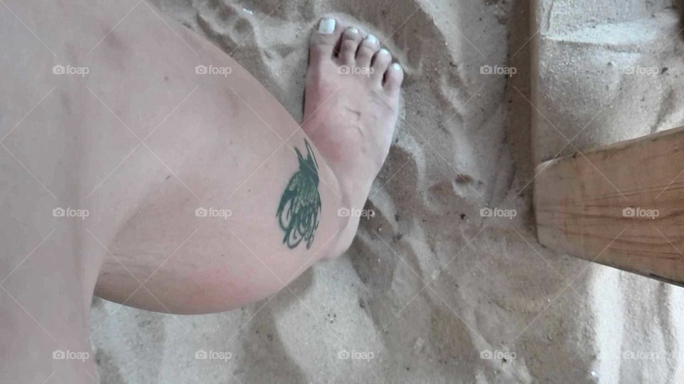 Foot meet sand