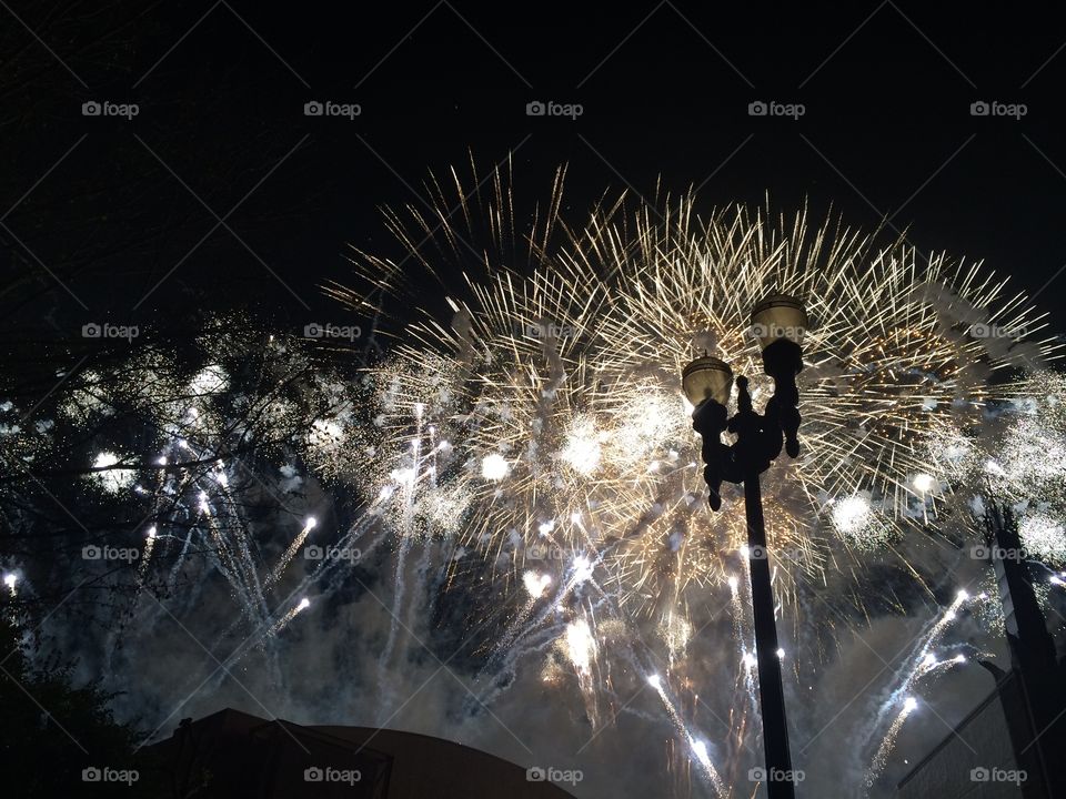 Firework display at night