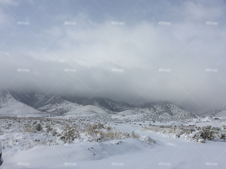 Snow clouds on mountain 