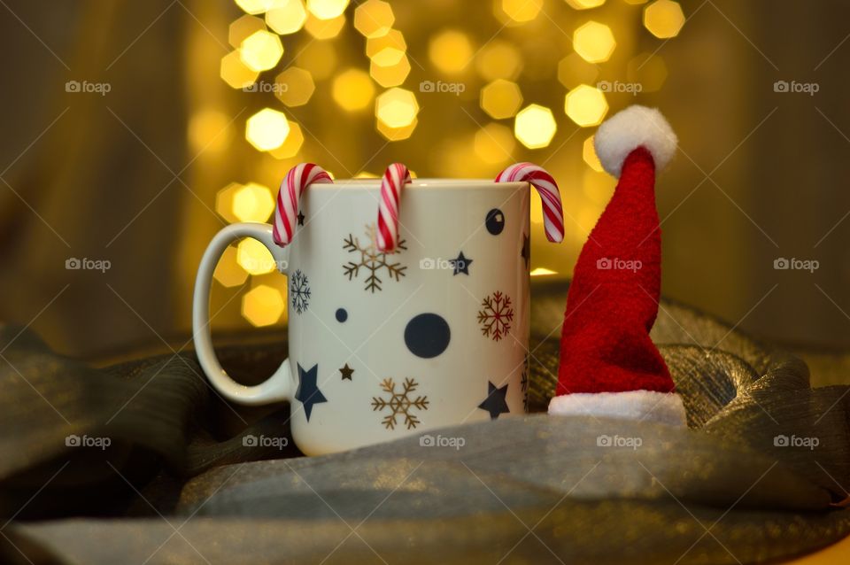 Santa's red cap and a cup of tea