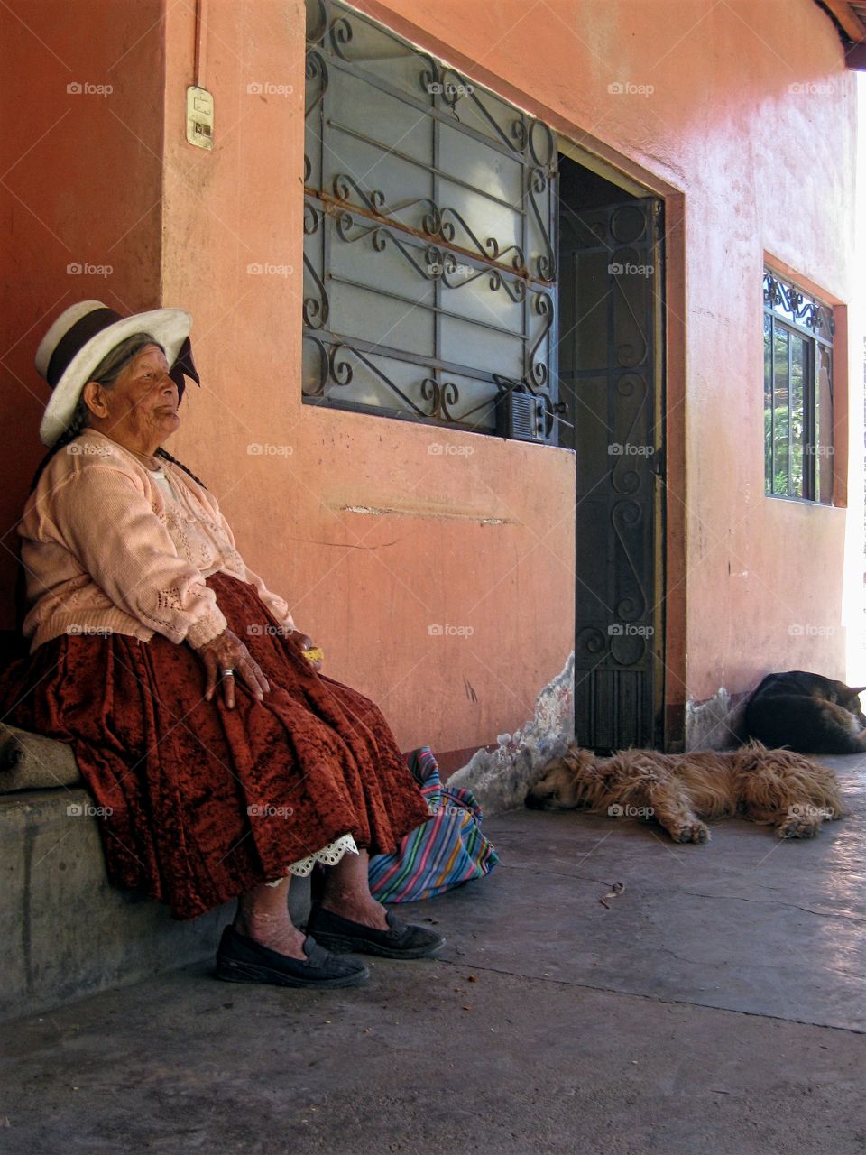 Peruvian woman with dog