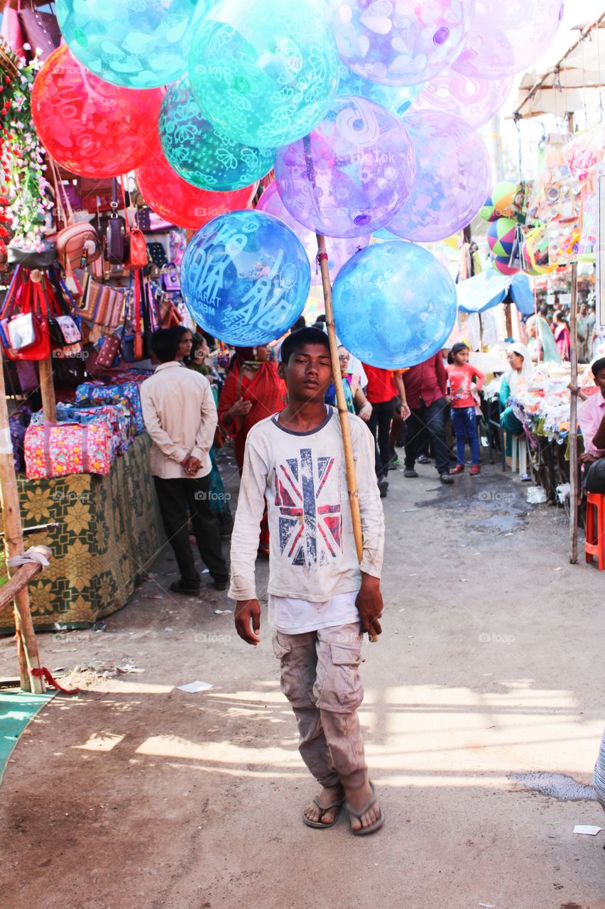 Balloon boy with tires face