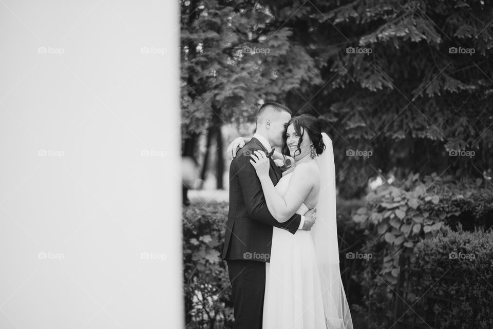 A black and white photo of people in love that grew into a family