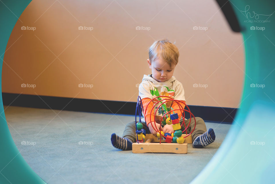 Boy playing with toys 