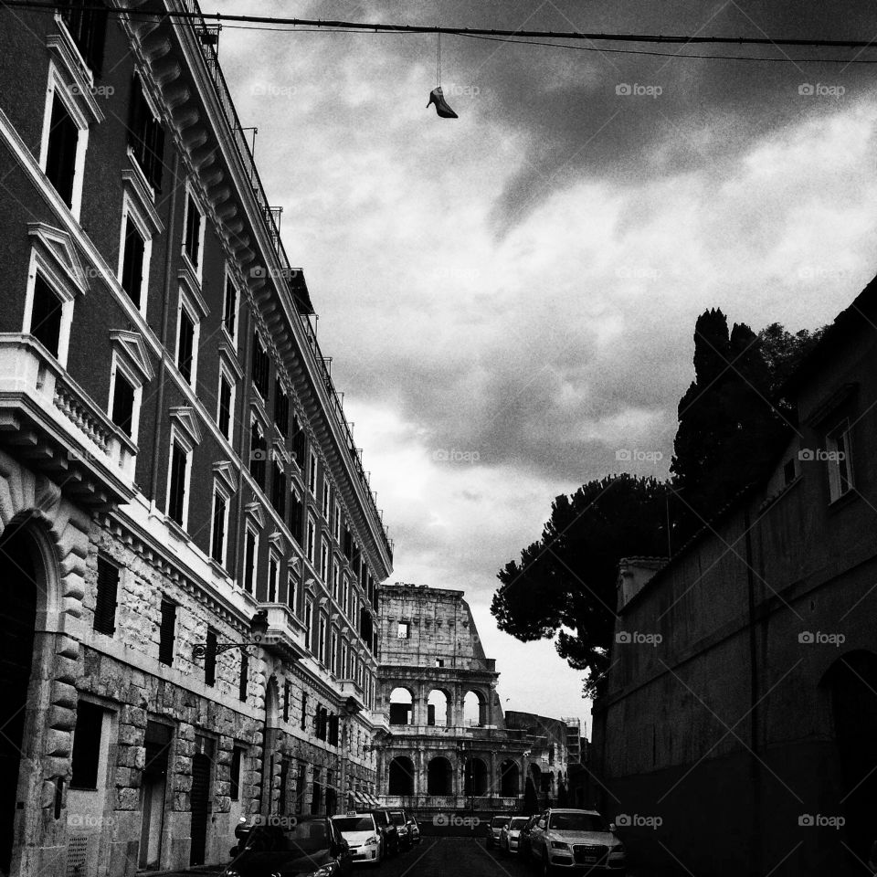 High Heels. Random pair of shoes hanging over telephone wires along a side street in Rome. Apologies for the terrible pun...
