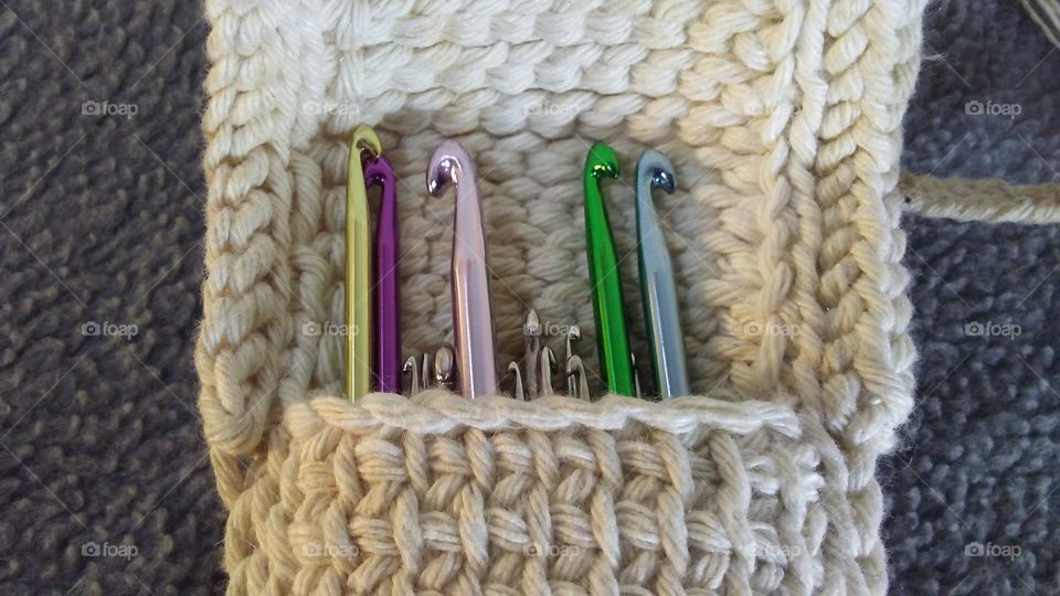close up crochet hooks in pouch