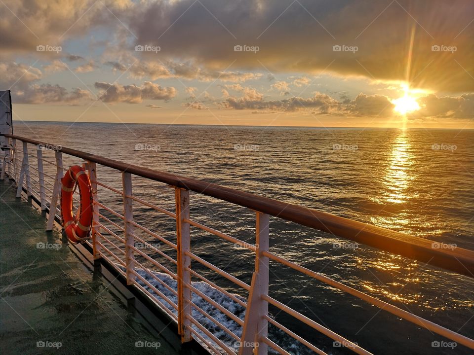 Sunrise from a shipdeck belonging to a ferry to the Îles-de-la-Madeleine. Québec. Canada