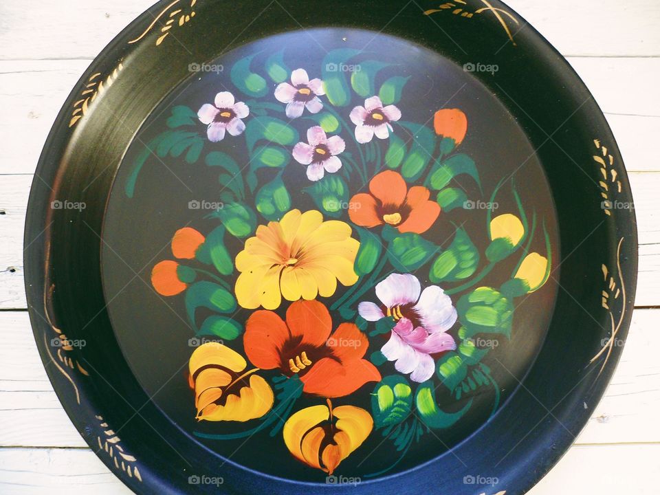 a large tray with decorative painting