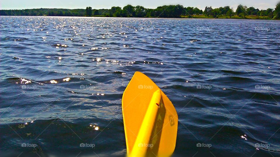 Yellow Kayaking Paddle on a beautiful summer's day. Pure Michigan