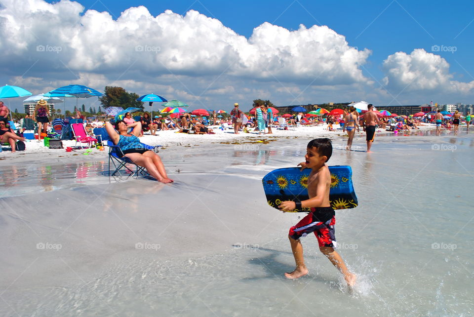 Siesta Fiesta. hustle and bustle of the 99% quartz sand beach in Siesta Key, Sarasota, Florida, one of the U.S. best beaches
