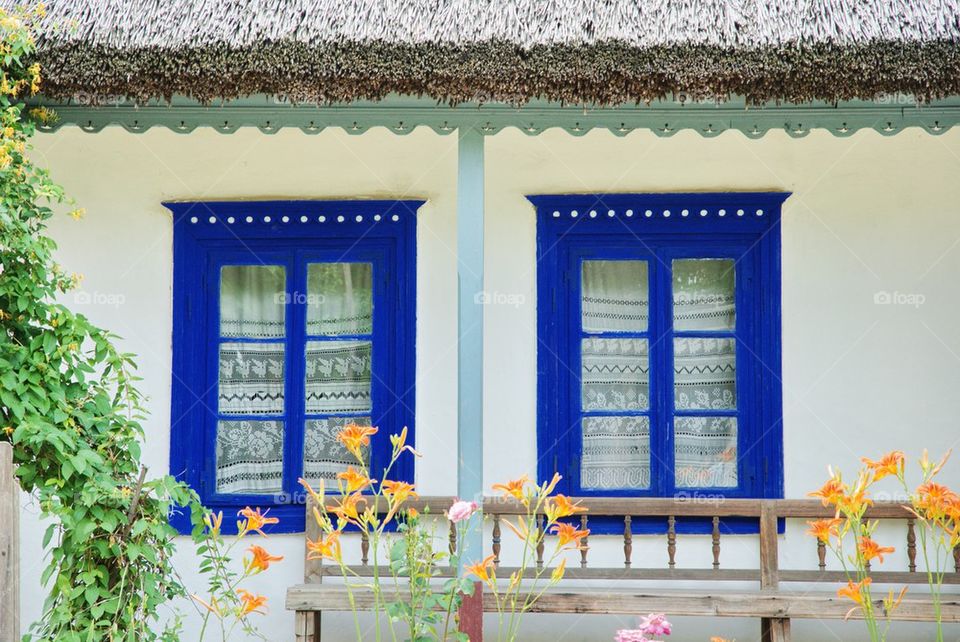 Blue windows of a traditional romanian house