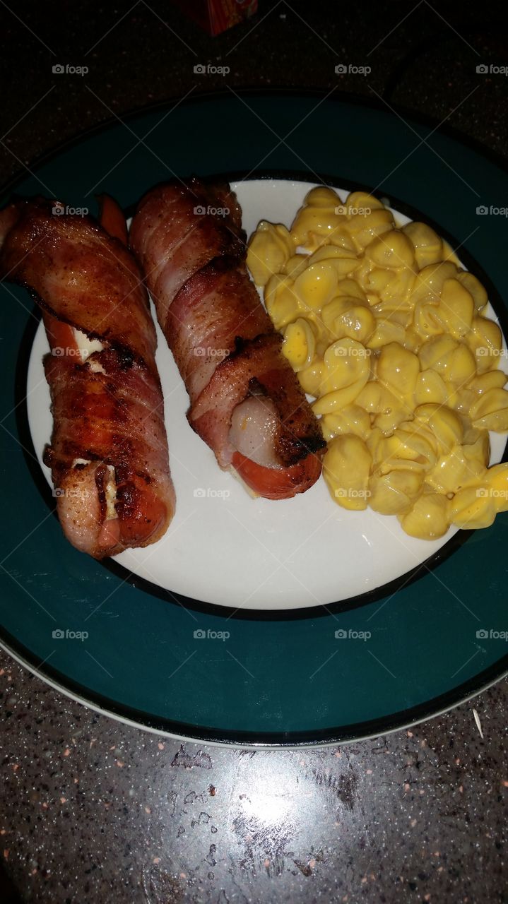 hotdogs, stringchees center with shells and cheese.