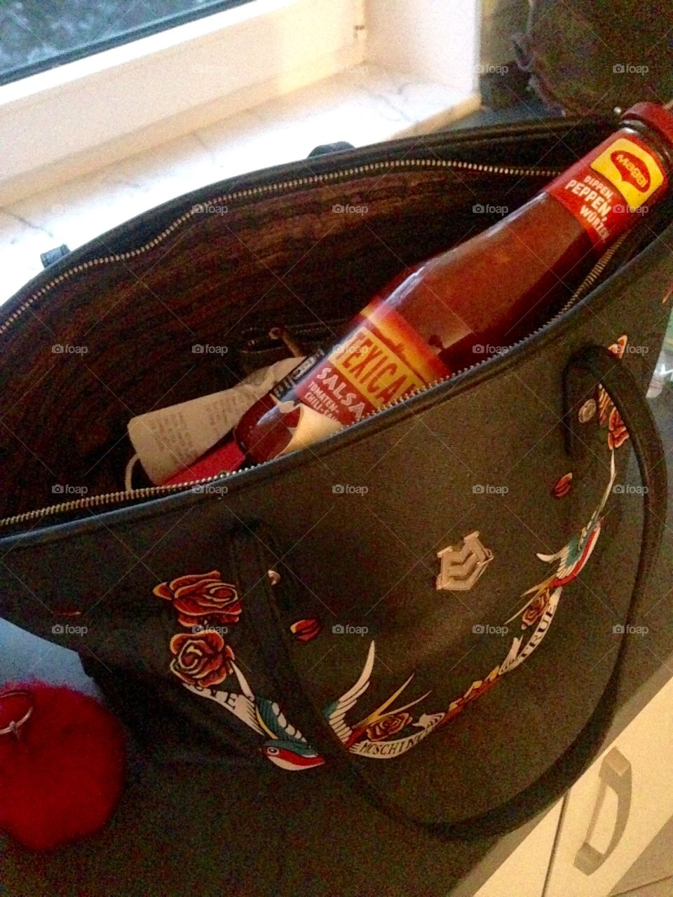 I got hot sauce in my bag. Swag! 