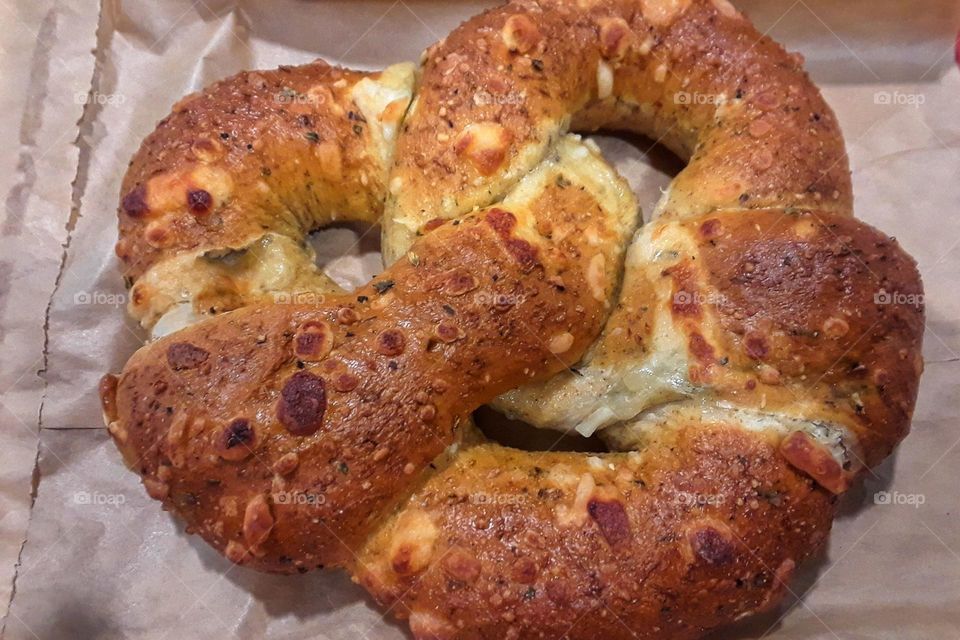 A close up photo of a spinach and feta cheese stuffed pretzel that I ordered at the cafe at Barnes and Noble. It was really good.