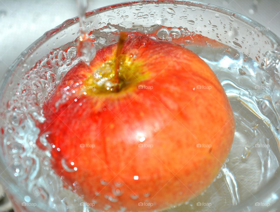 Extreme close-up of apple in water