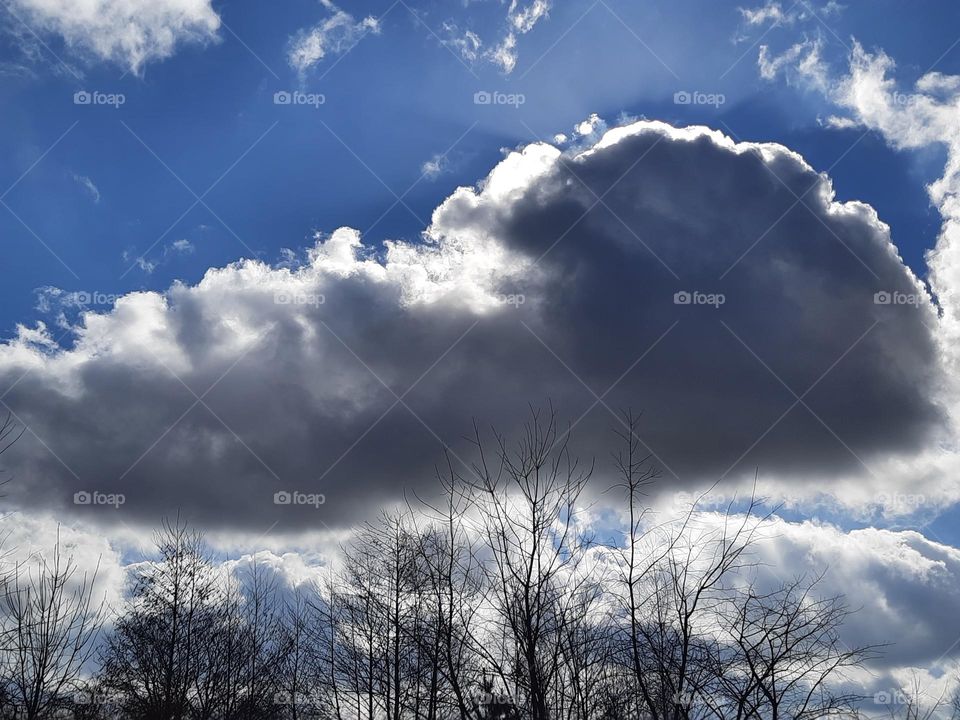 grey and white clouds before snowfall