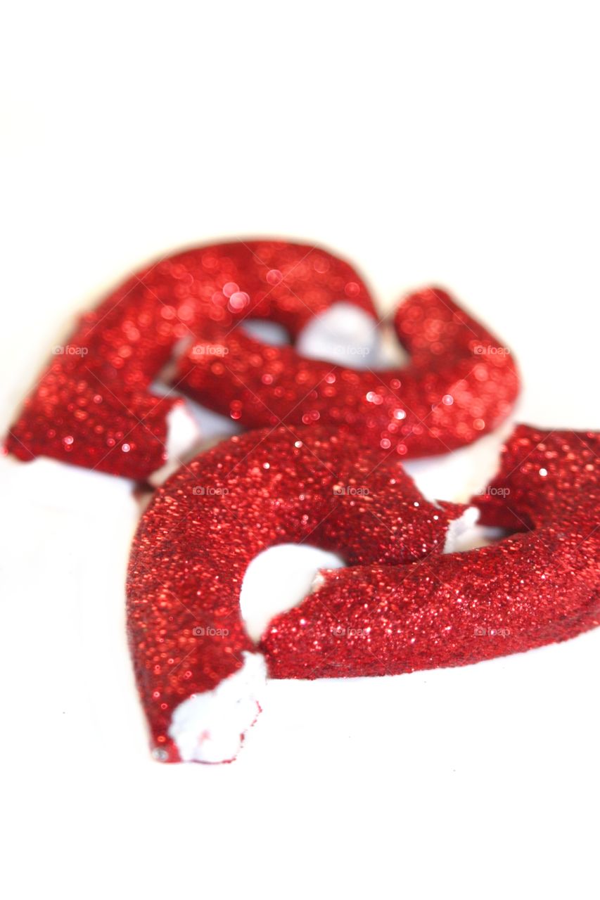 Broken Heart
Pieces of a red broken hard on white background