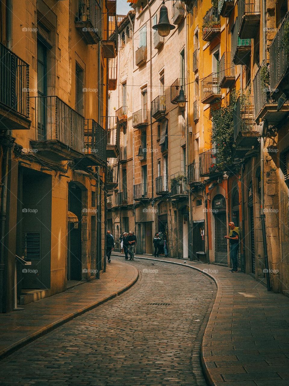 Golden street of Girona, Catalunya, Spain.