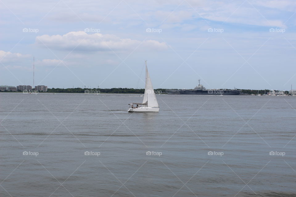 Watching the sailboat across from the ship