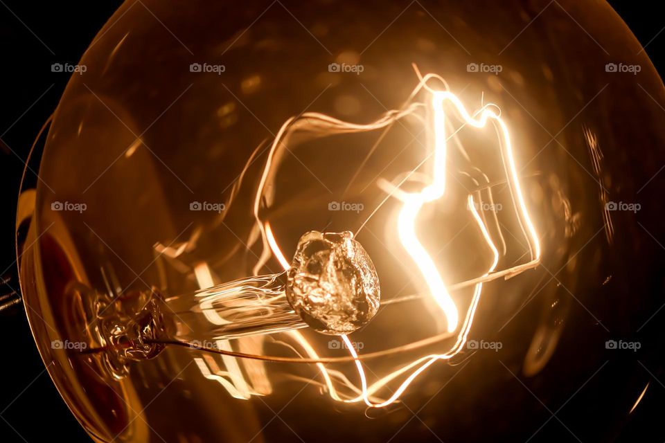 Macro close up electricity electric power high voltage current lightbulb light bulb cool abstract glow glowing bright illumination illuminated shining Electric volt energy glass wattage inspiring awesome interesting picture photo amateur lighting 